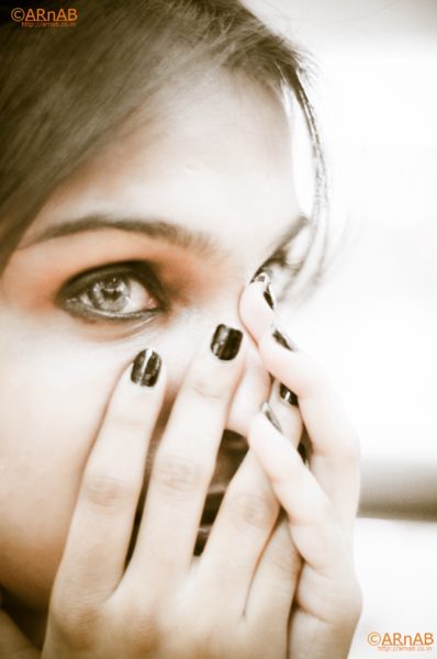 A glance through fingers