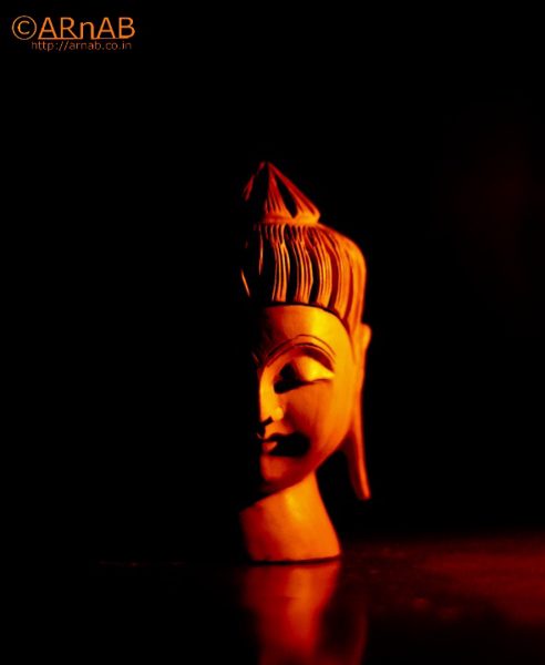 Buddha head, reflected